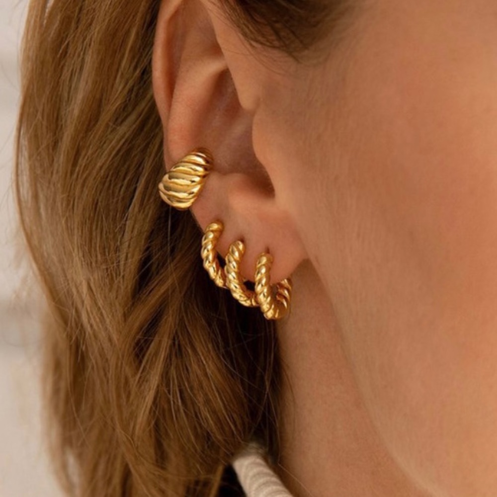 Trio of gold tiny twisted hoop earrings